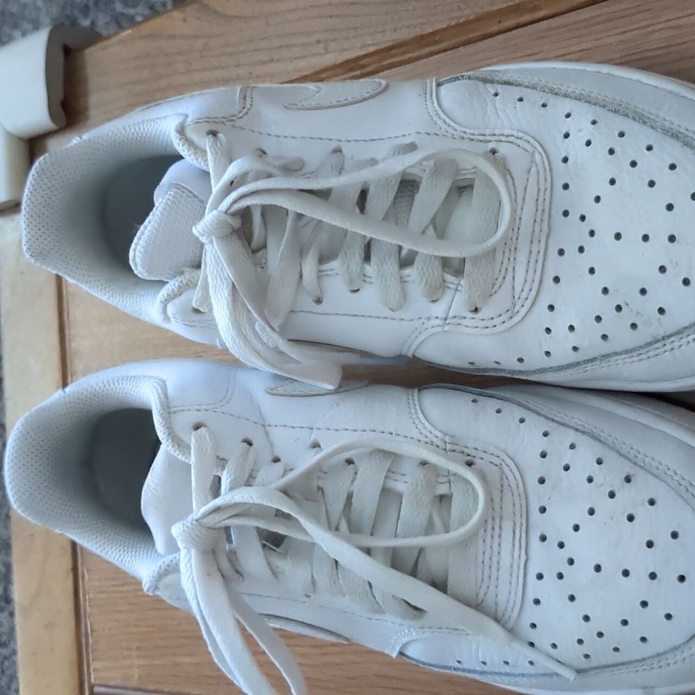 Nike tennis shoes .